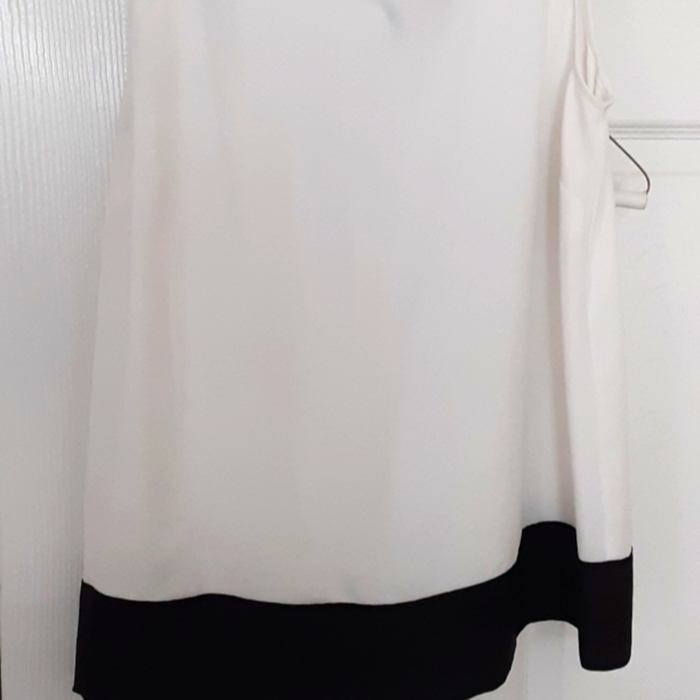 White sleeveless blouse